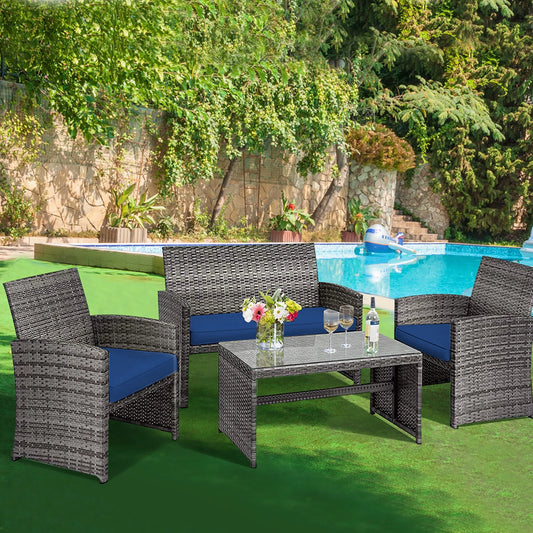 Elegant 4-Piece Navy Rattan Patio Furniture Set with Glass Table - Exceptional Comfort for Outdoor Living